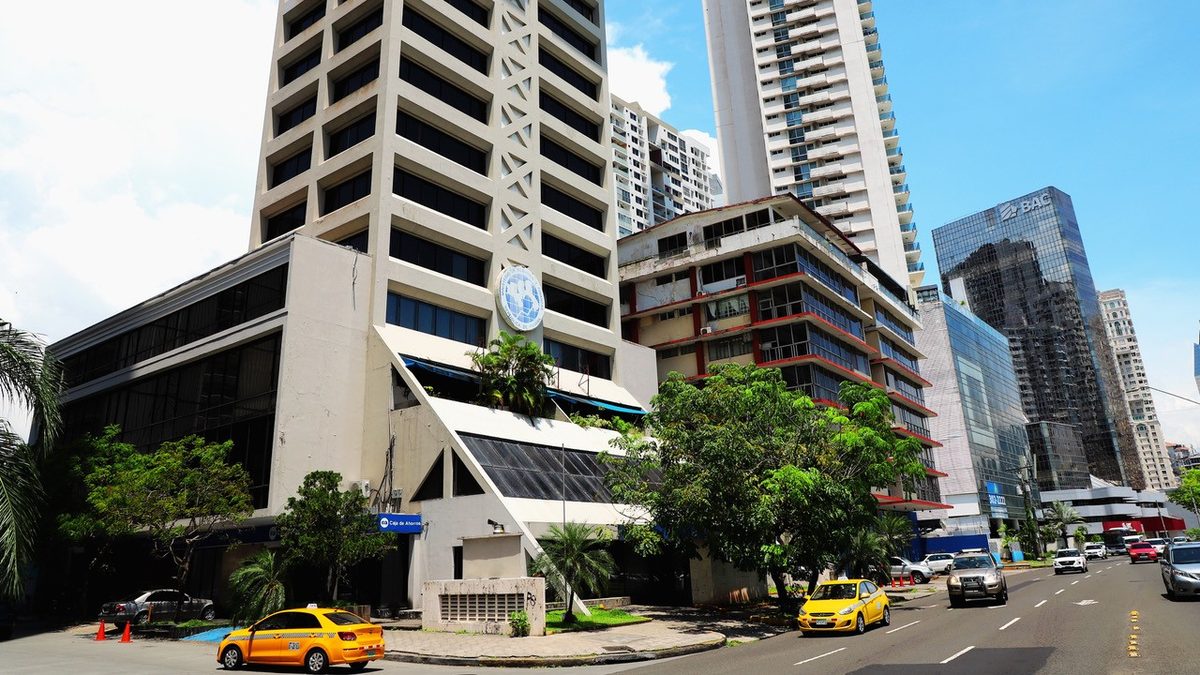 Exterior of the DGI offices on Avenida Balboa in Panama City with signage visible at the entrance