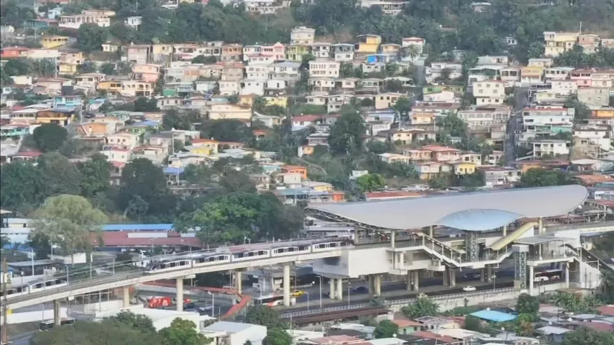 An abandoned junk car parked along a street in San Miguelito, Panama, blocking part of the public right of way