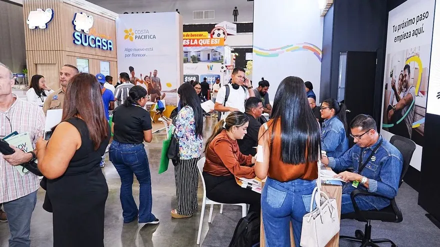 Visitors walking through a housing and real estate expo at the Panama Convention Center in Panama City