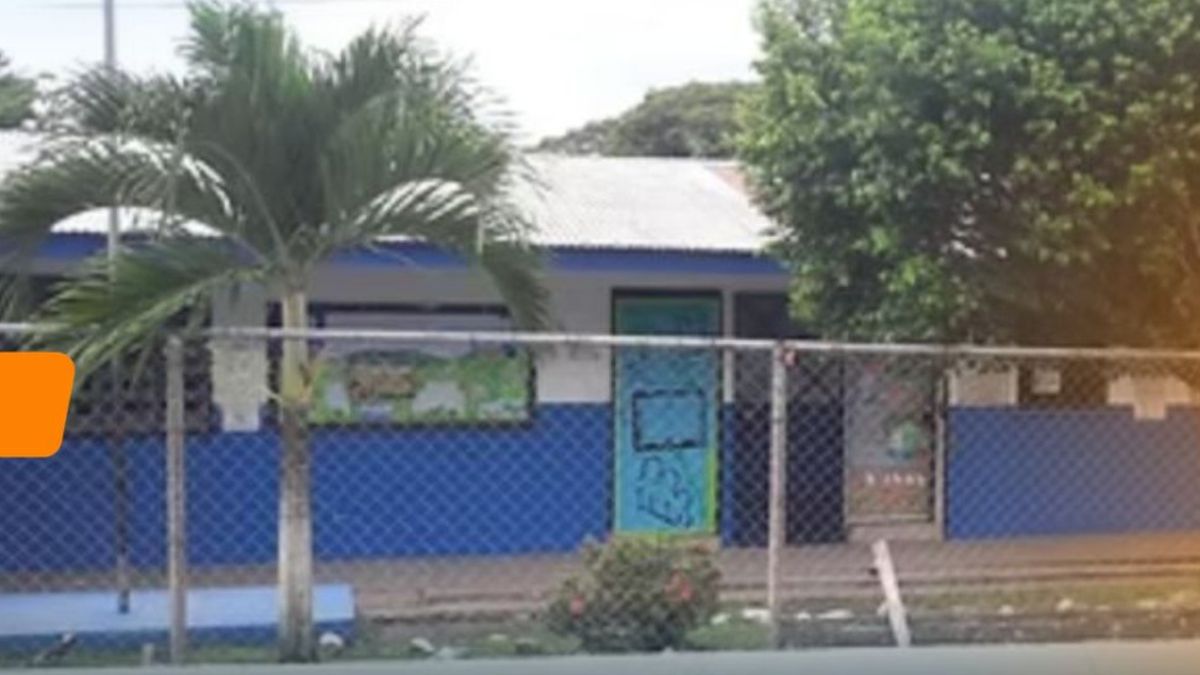 Students and school officials near the entrance of a public school in Rufina Alfaro, Panama