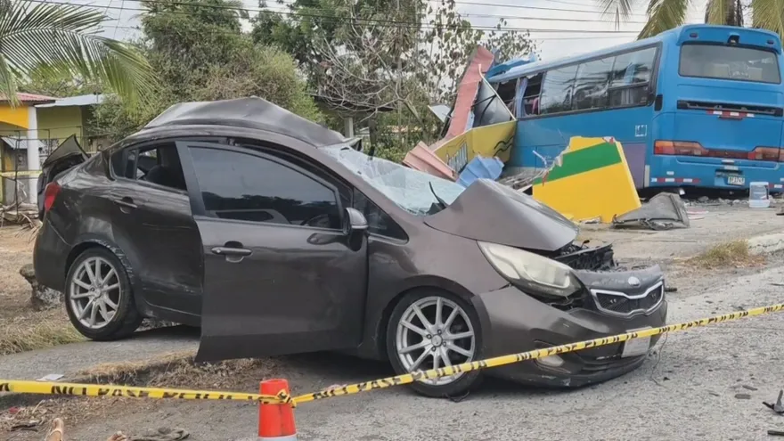 Faded blue heart memorials painted on a roadway in Chame, Panama, marking sites of fatal traffic accidents