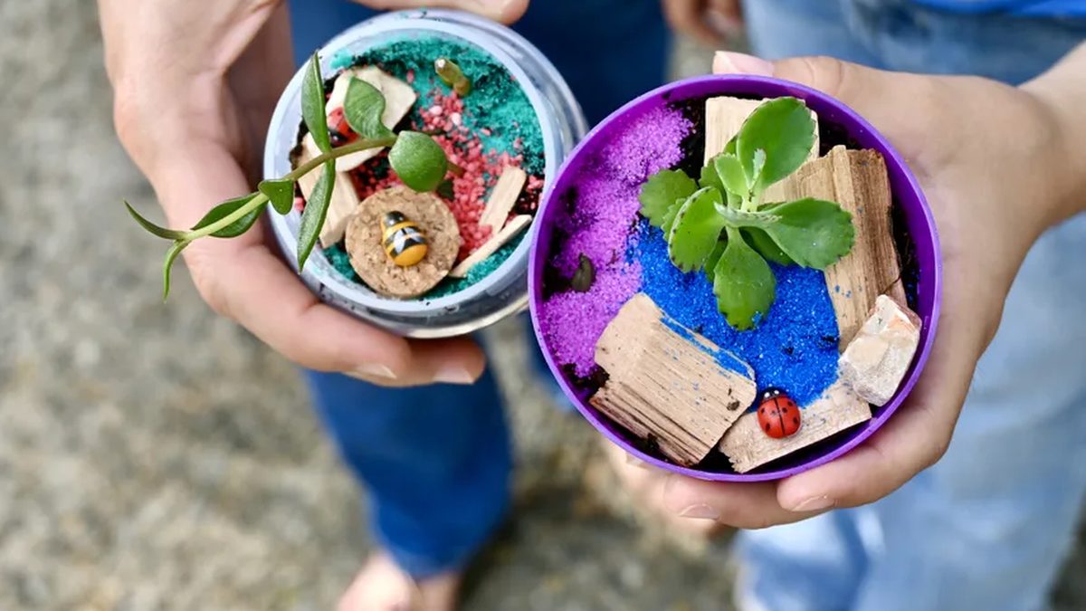 People creating art from recycled materials in a community workshop at Plaza Las Américas in Panama City