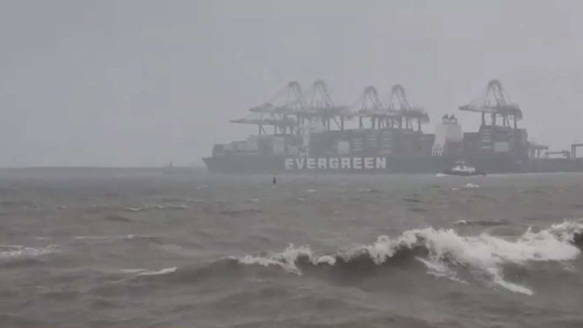 Dark rain clouds over Panama with streets or neighborhoods affected by wet weather