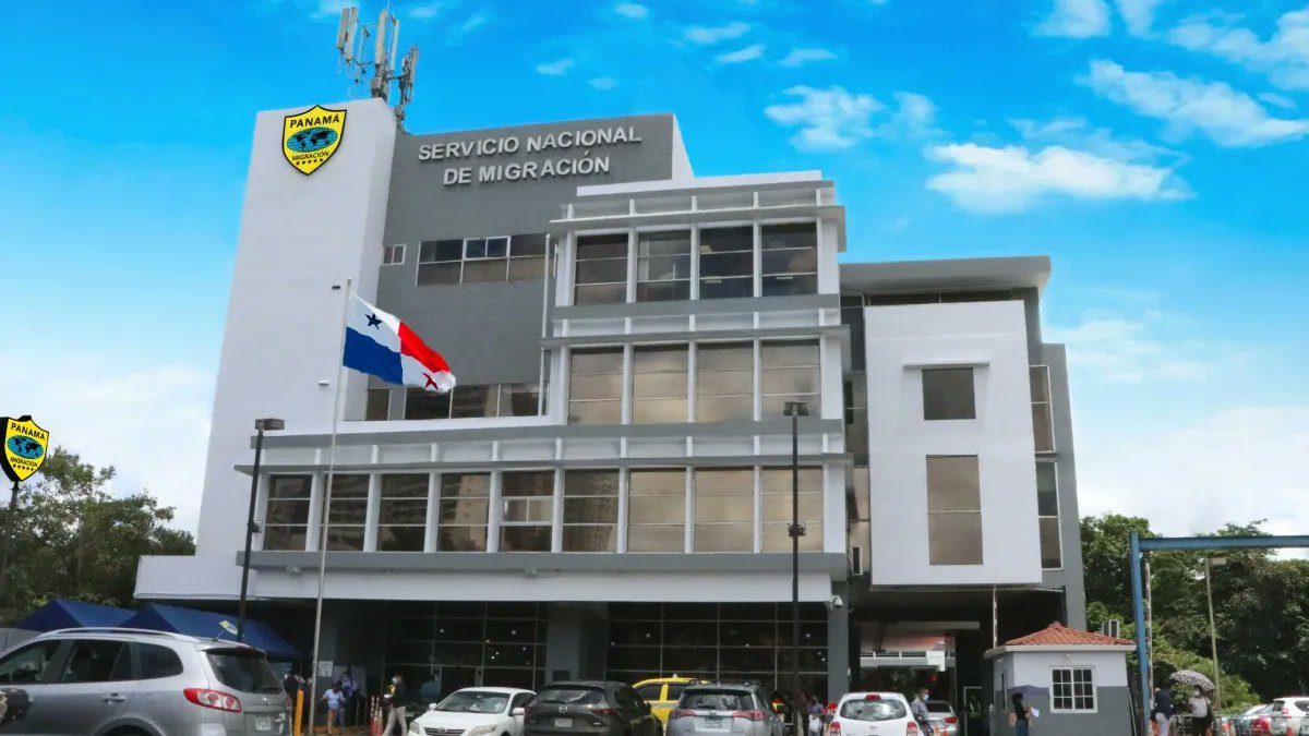 A lawyer reviewing migration documents in Panama with a passport and paperwork on a desk