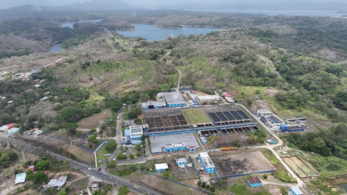 Technicians assessing equipment at a water treatment plant in Panama after an electrical incident
