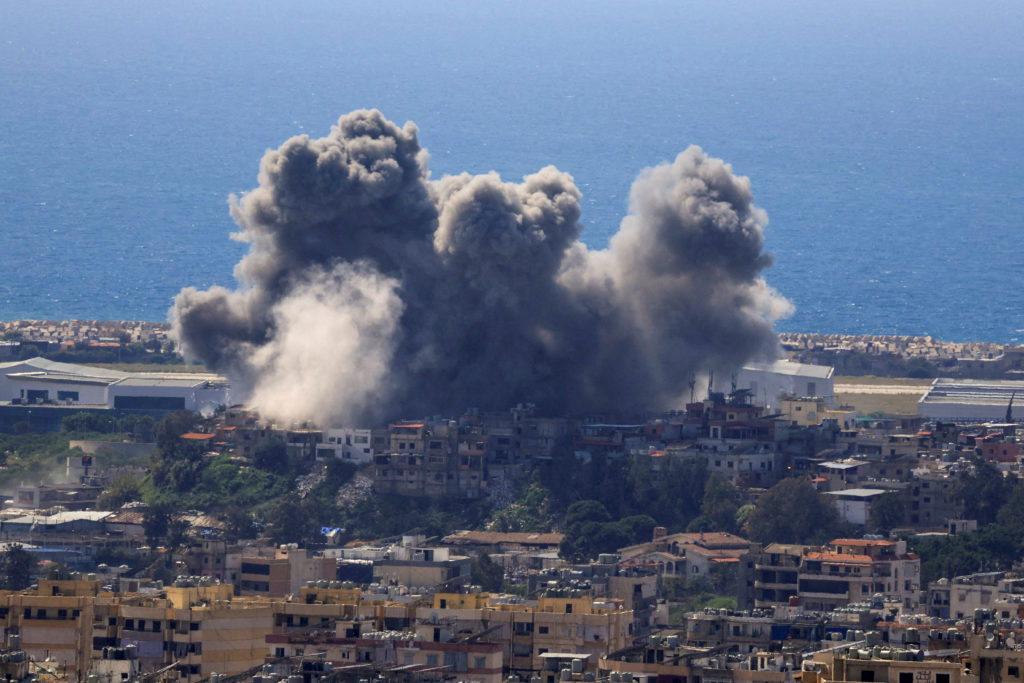 Smoke rises over buildings after an Israeli strike in Lebanon amid rising Middle East tensions