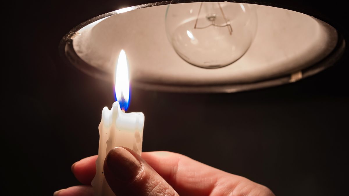 Electrical utility crews or power lines in an urban area of Panama during maintenance work