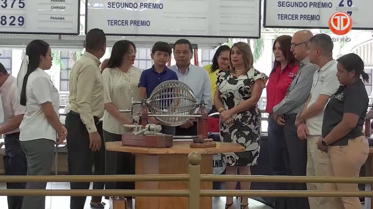 People checking National Lottery of Panama results during a televised draw