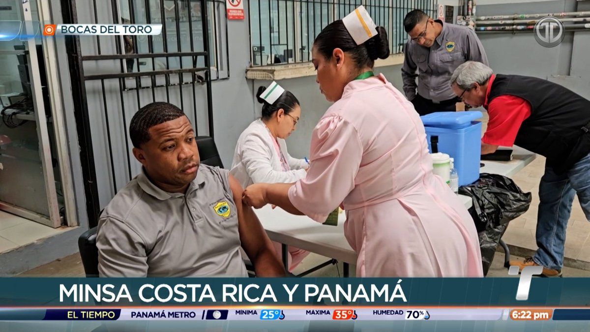 Health officials at a Panama-Costa Rica border checkpoint coordinating vaccination and disease prevention measures