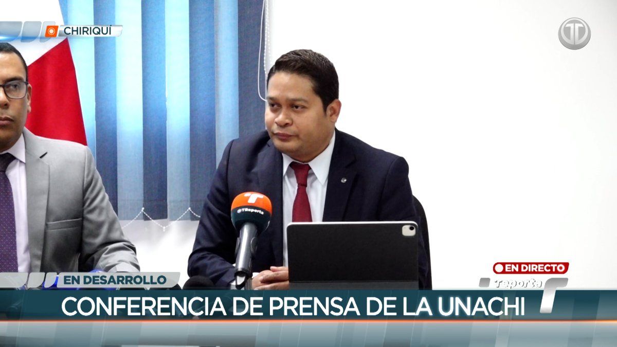 University officials and lawyers speaking outside the Autonomous University of Chiriquí after an inspection by prosecutors
