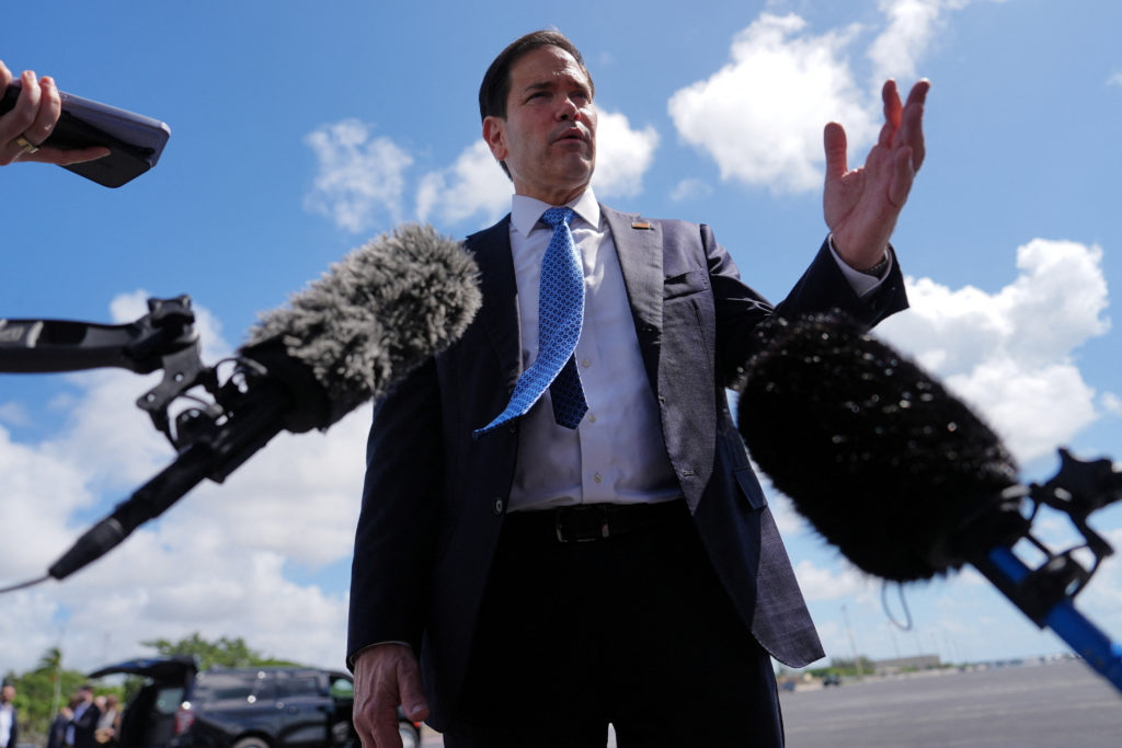 Marco Rubio speaking at a podium about U.S. policy toward Cuba