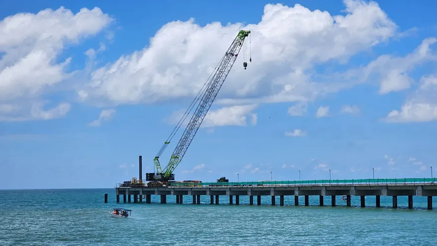 Biologists assessing coastal marine life near the Puerto Armuelles wharf site in Panama