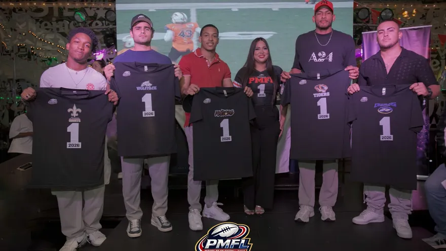 American football players and coaches preparing for a league draft before the season opener in Panama City