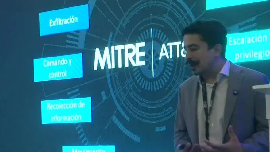 A cybersecurity professional reviewing digital threat alerts on a computer screen in Panama