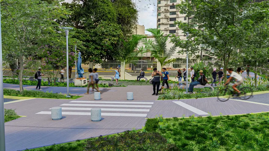 A small green pocket park with benches and trees set between buildings in Panama City